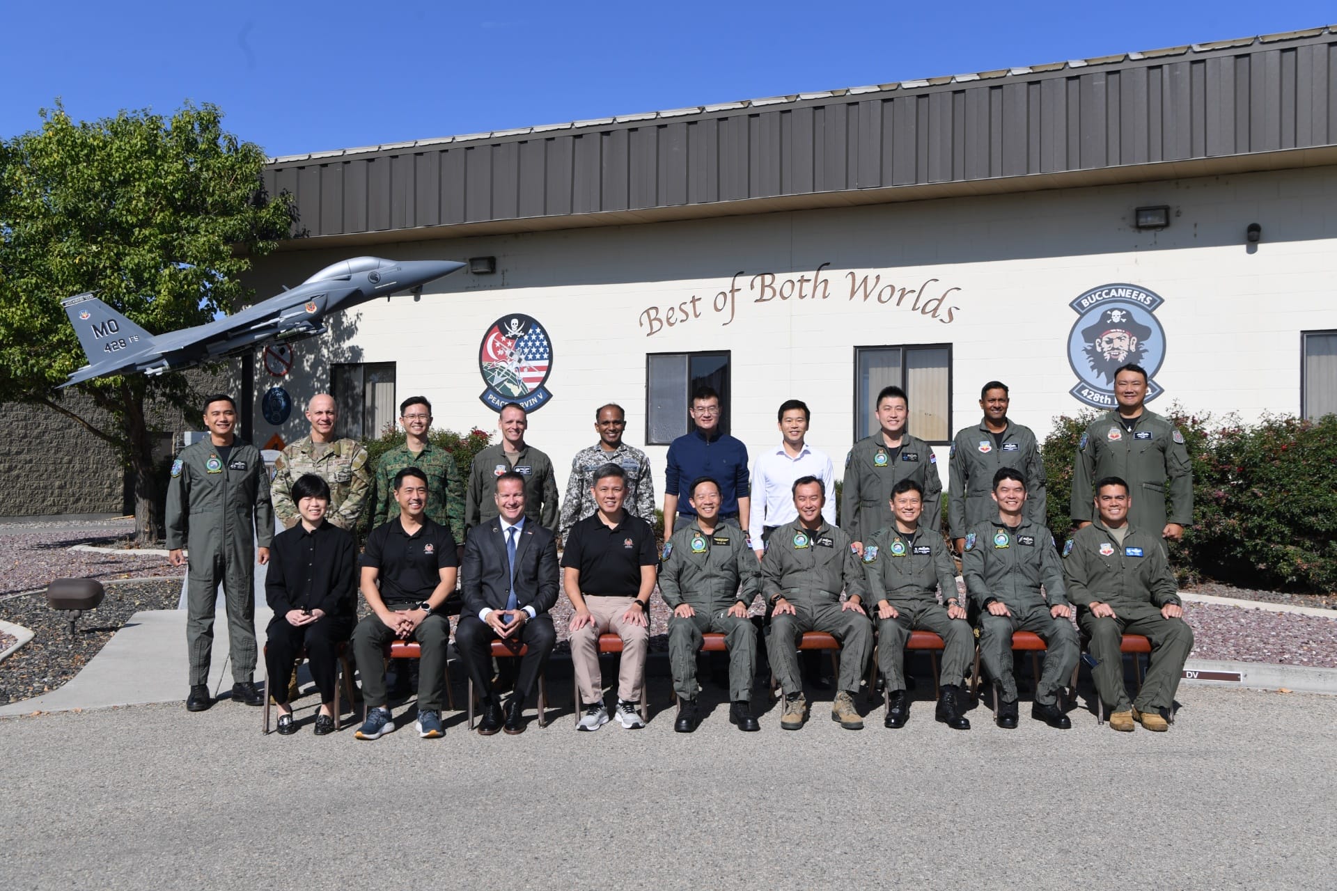 Mr Chan and Mayor of Mountain Home Mr Rich Sykes with personnel from the Republic of Singapore Air Force (RSAF) and The 