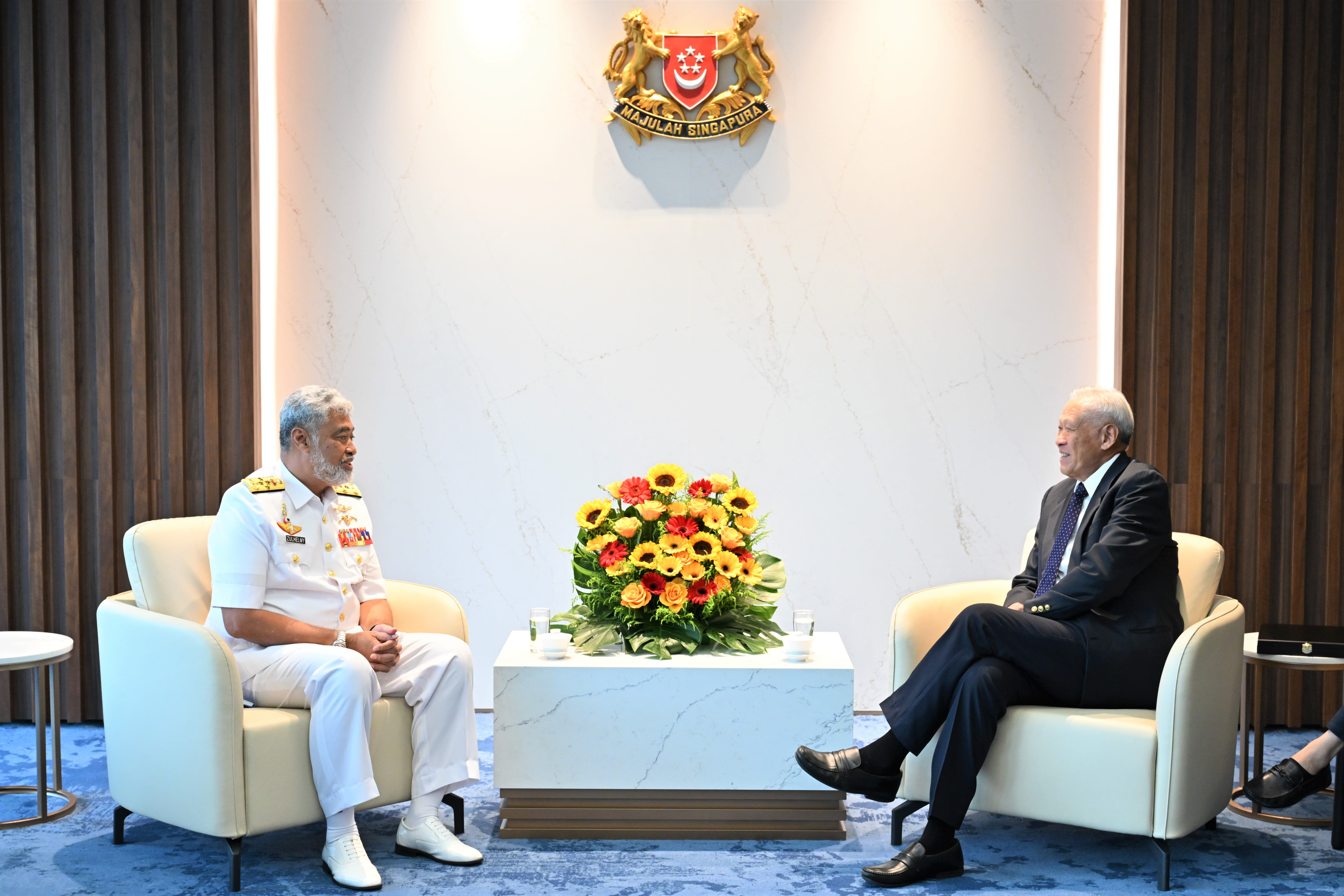 Chief of the Royal Malaysian Navy Admiral (ADM) Datuk Zulhelmy bin Ithnain (left) calling on Minister for Defence Dr Ng Eng Hen (right).