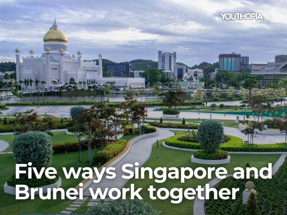 Sultan Omar Ali Saifuddin Mosque with gold dome overlooks a park with walking paths and text overlay.