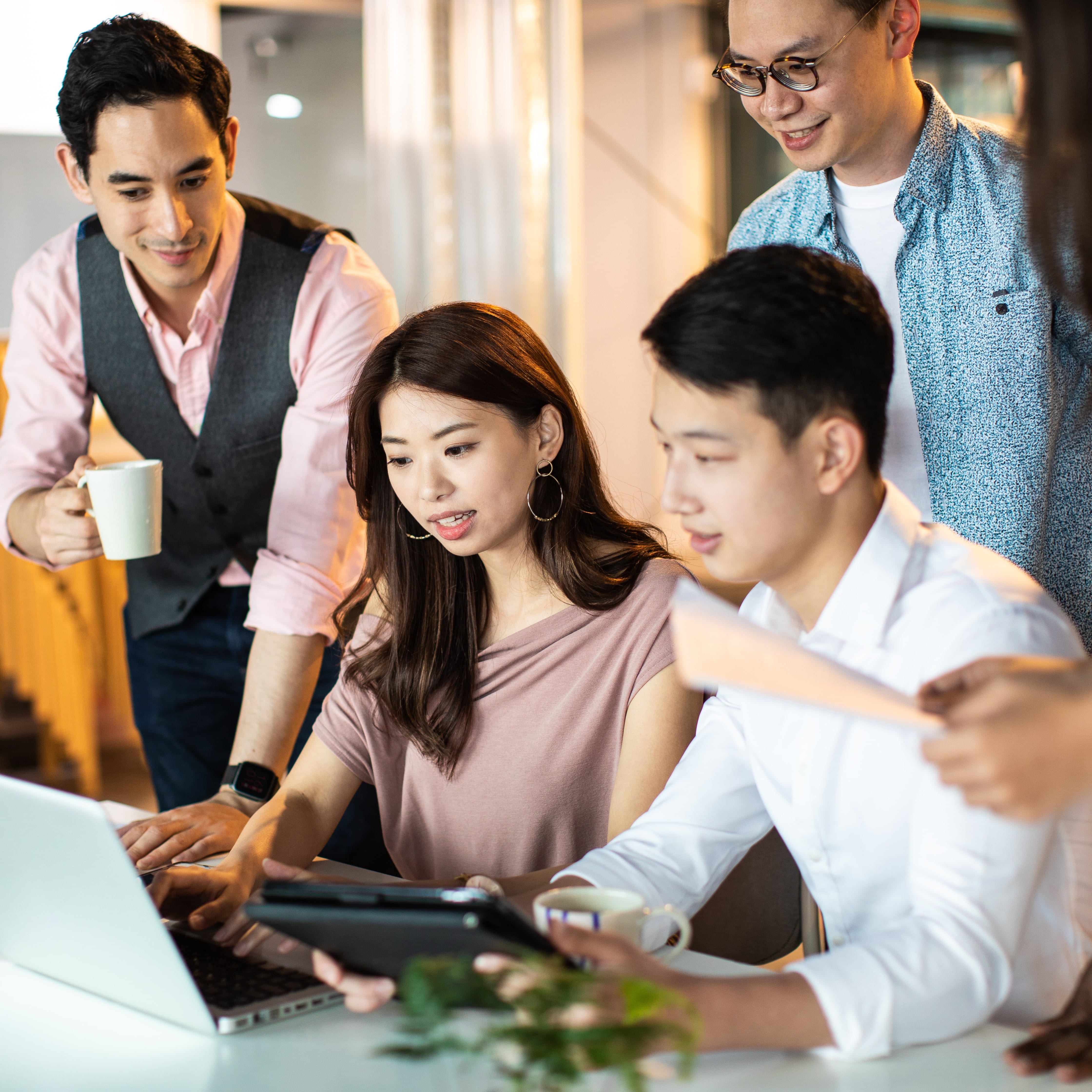 Group looking at laptop