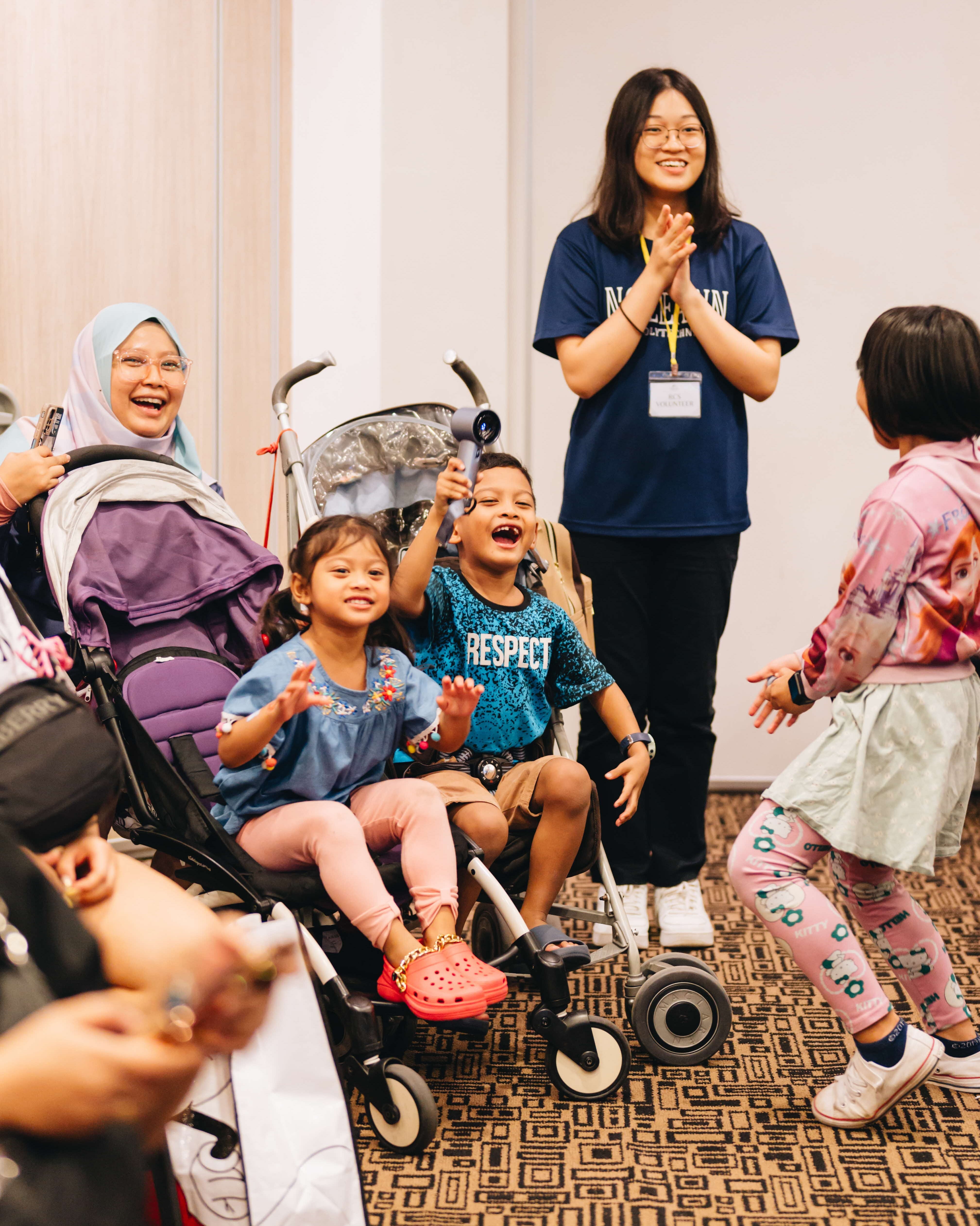Mdm Huraizah and kids enjoying activities