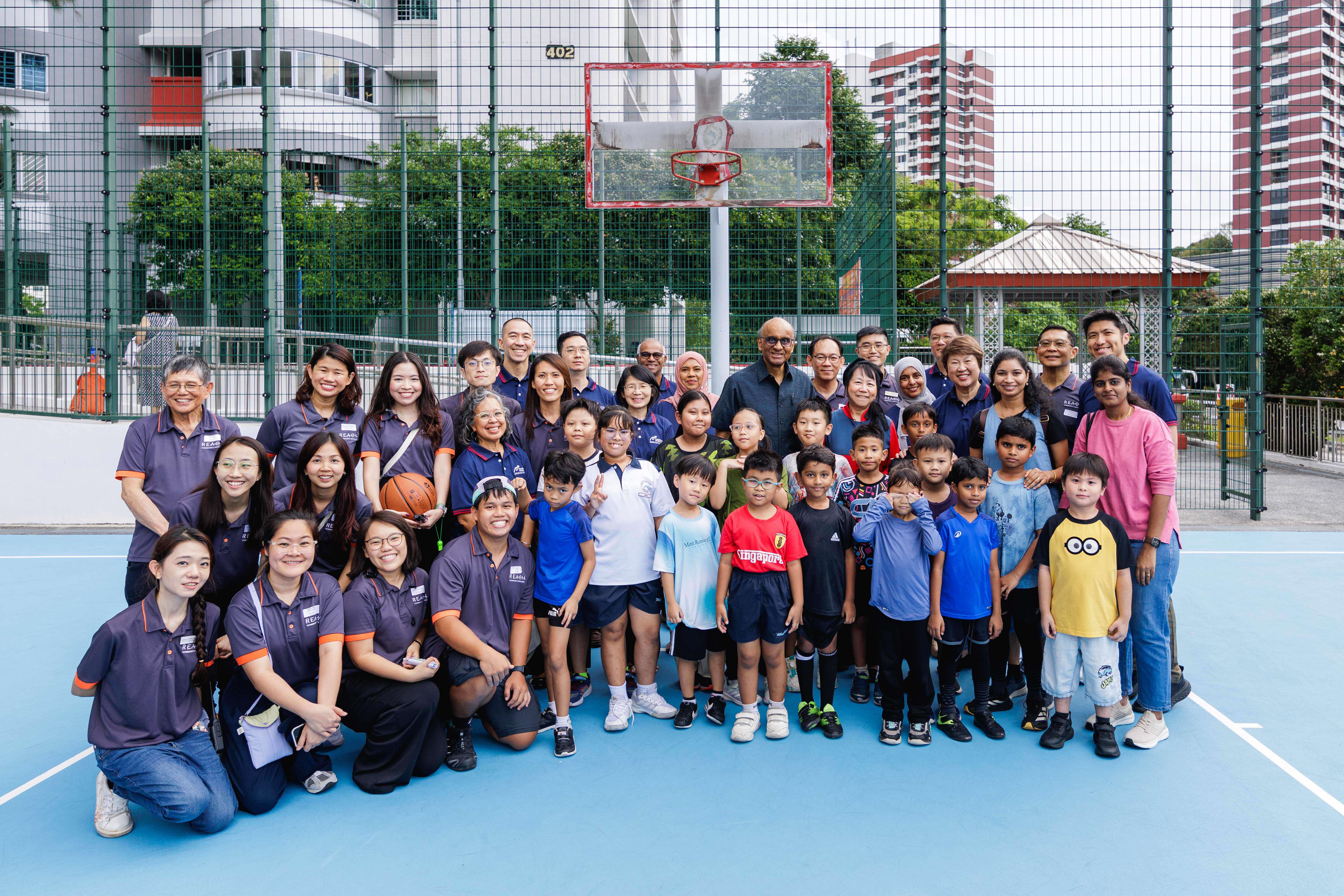 Mr & Mrs Tharman with group of children, REACH and PC Council members and NCSS team
