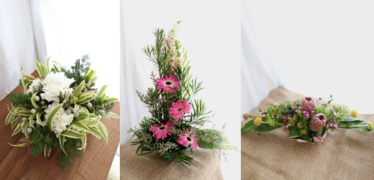 Three floral arrangements: white flowers with green foliage, tall pink blooms and pink buds on burlap.