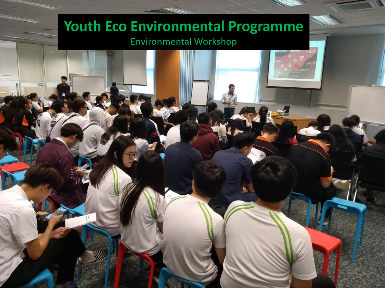 Students attending a Youth Eco Environmental Programme workshop listen to a presenter.