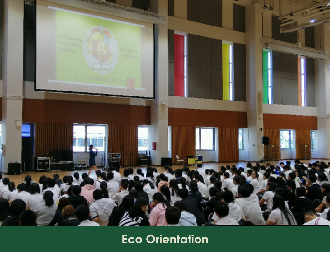 Audience seated for presentation; screen reads 'Eco Orientation 2014.'