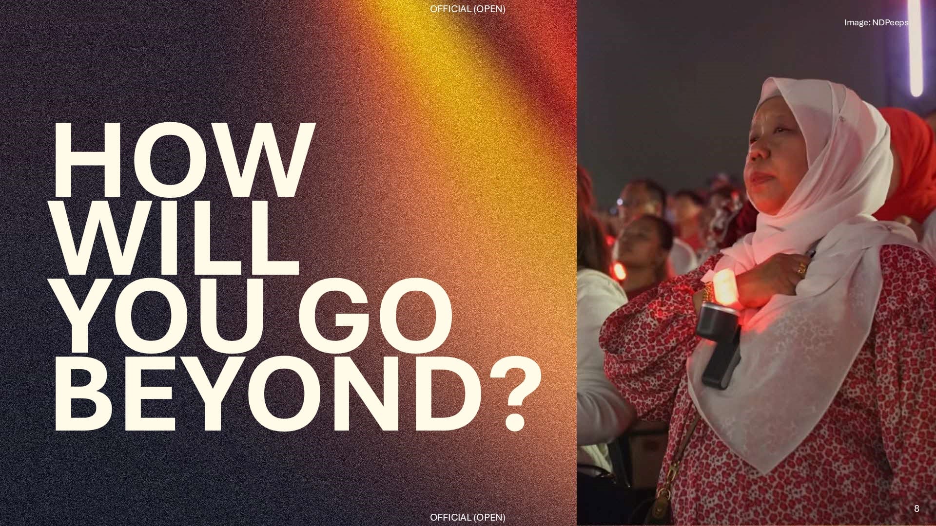 A Singaporean Malay lady places her hand over her heart during the National Anthem beside the question, "How will you go beyond?", encouraging personal reflection and action.