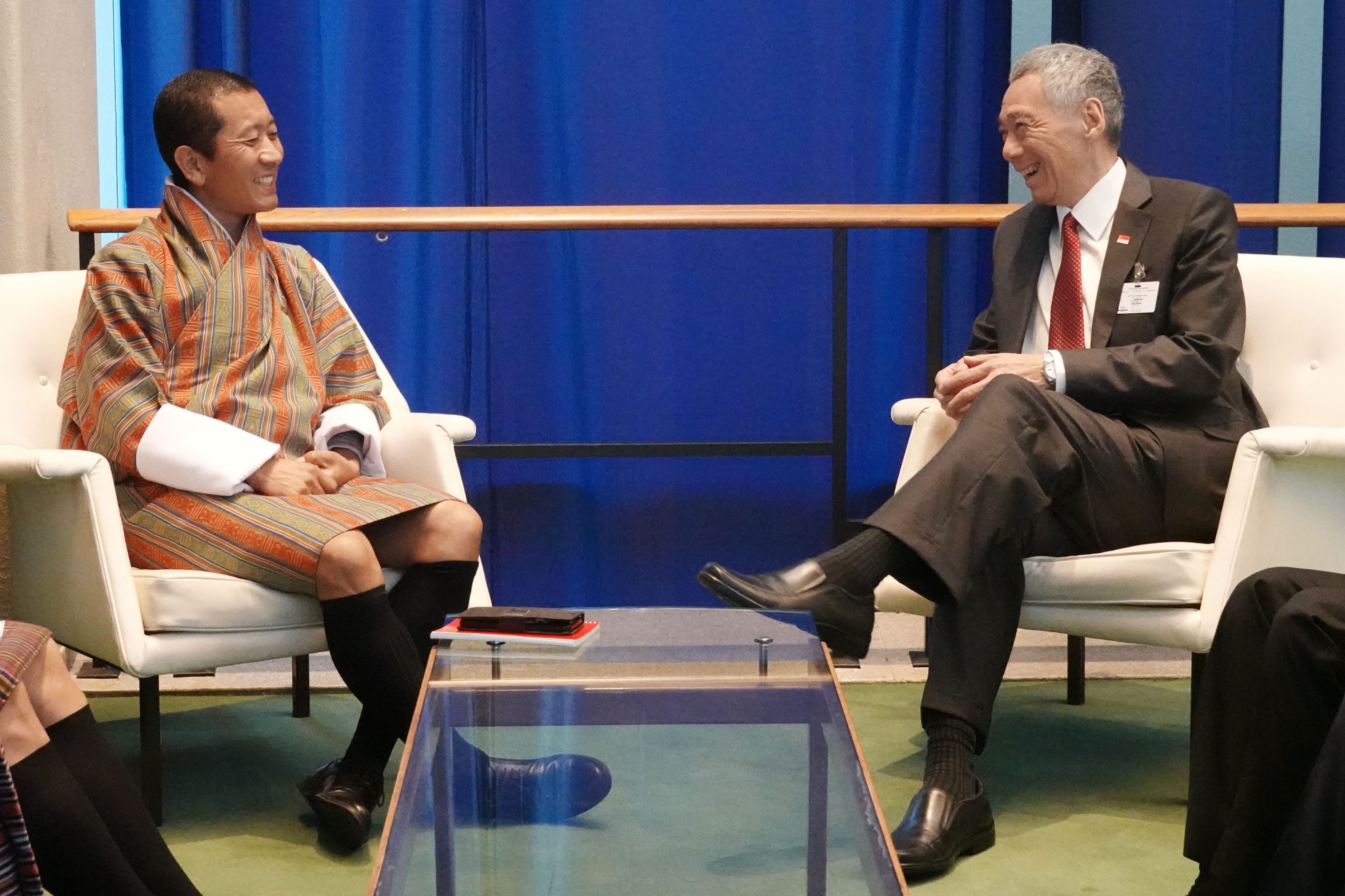 Two men seated and facing each other during a discussion. One man is Lee Hsien Loong.