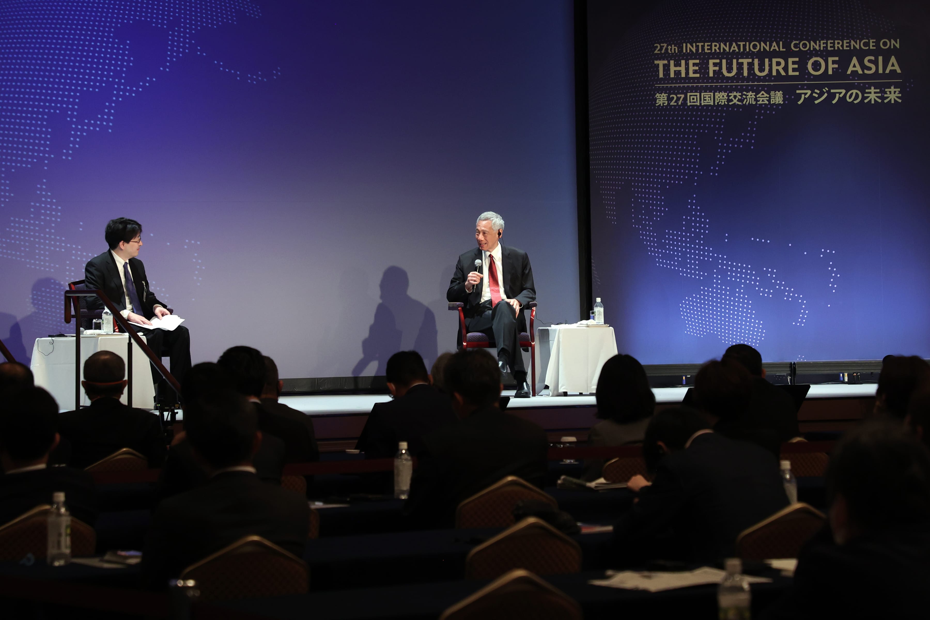 Lee Hsien Loong at Future of Asia conference addressing audience from a stage.