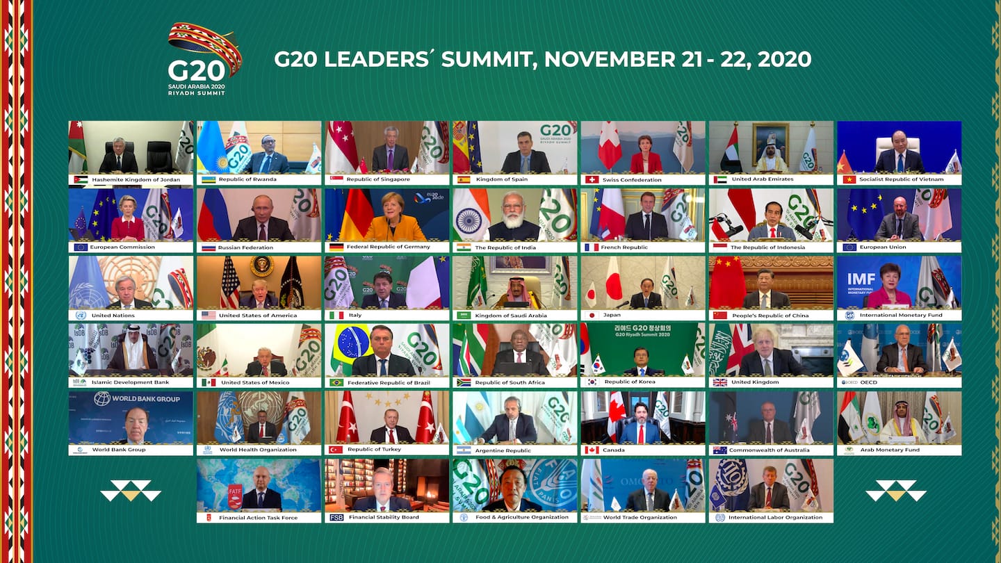 G20 Leaders' Summit virtual meeting screen showing world leaders and organization logos.
