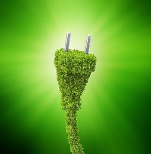Green power plug made of leaves symbolising sustainable energy efficiency.