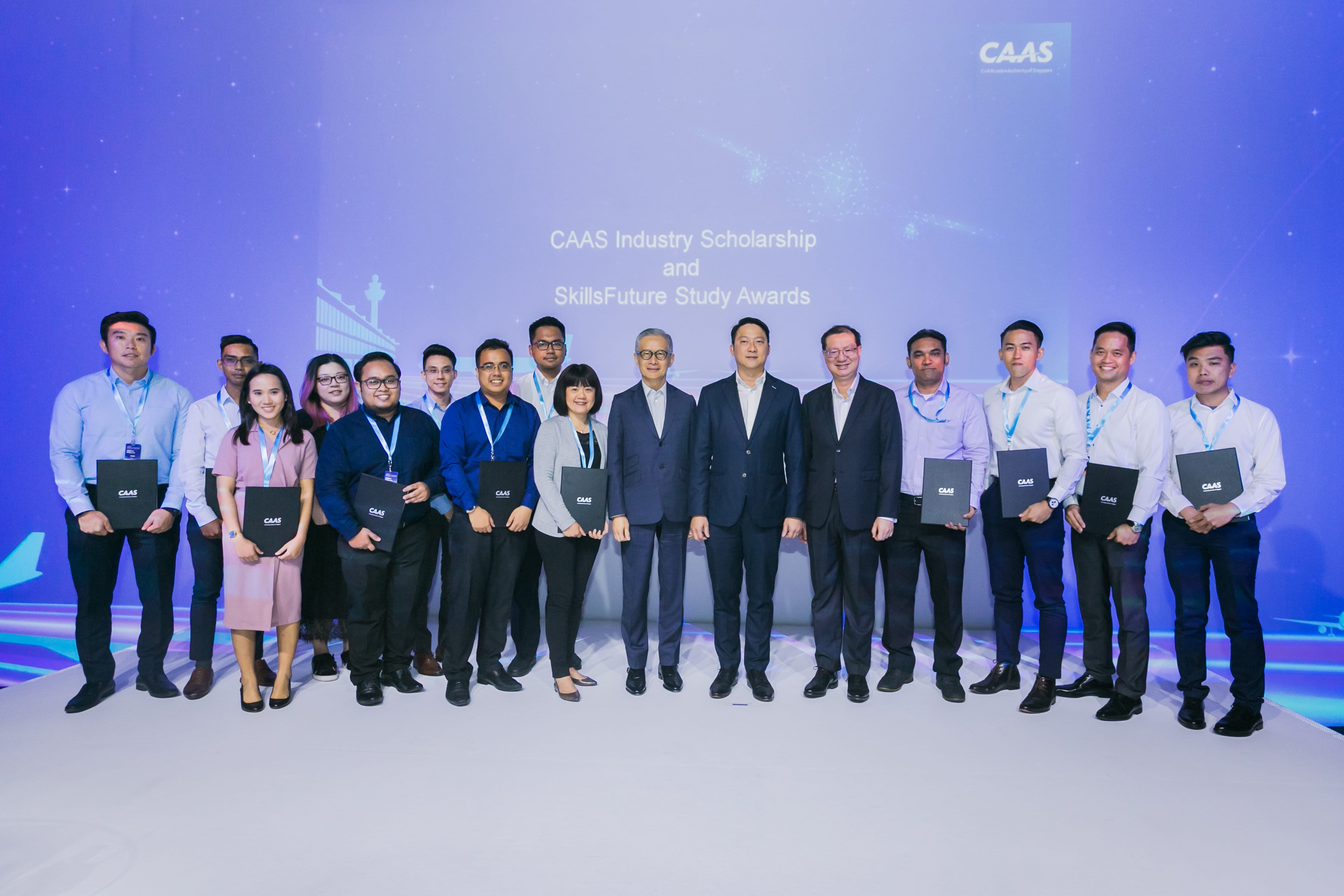 CAAS Chairman Mr Edmund Cheng, SMS Dr Lam Pin Min, CAAS DG Mr Kevin Shum with the CAAS Industry Scholarship and SkillsFuture Study award recipients