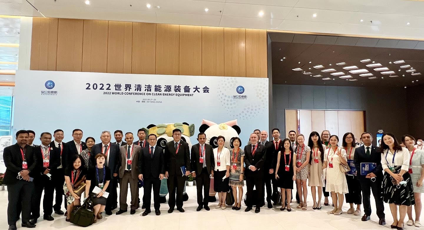 Singapore Embassy's Lunar New Year 2025 reception invitation, with red lanterns and cloud decorations.