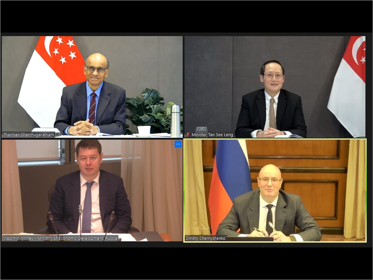 Four people in suits on a video call; Singapore and Russian flags visible.