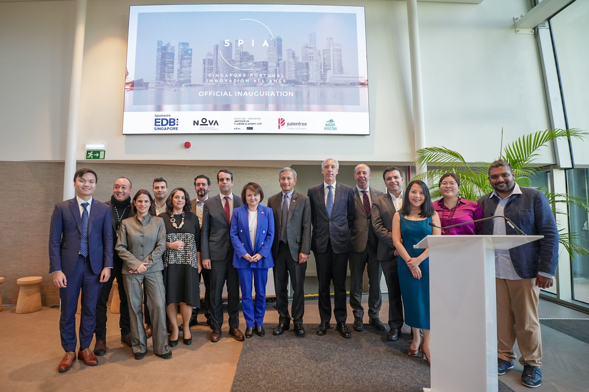 Group poses at SPIA official launch. Logos of EDB, NOVA, Patentree, Hakan Madeira are visible.