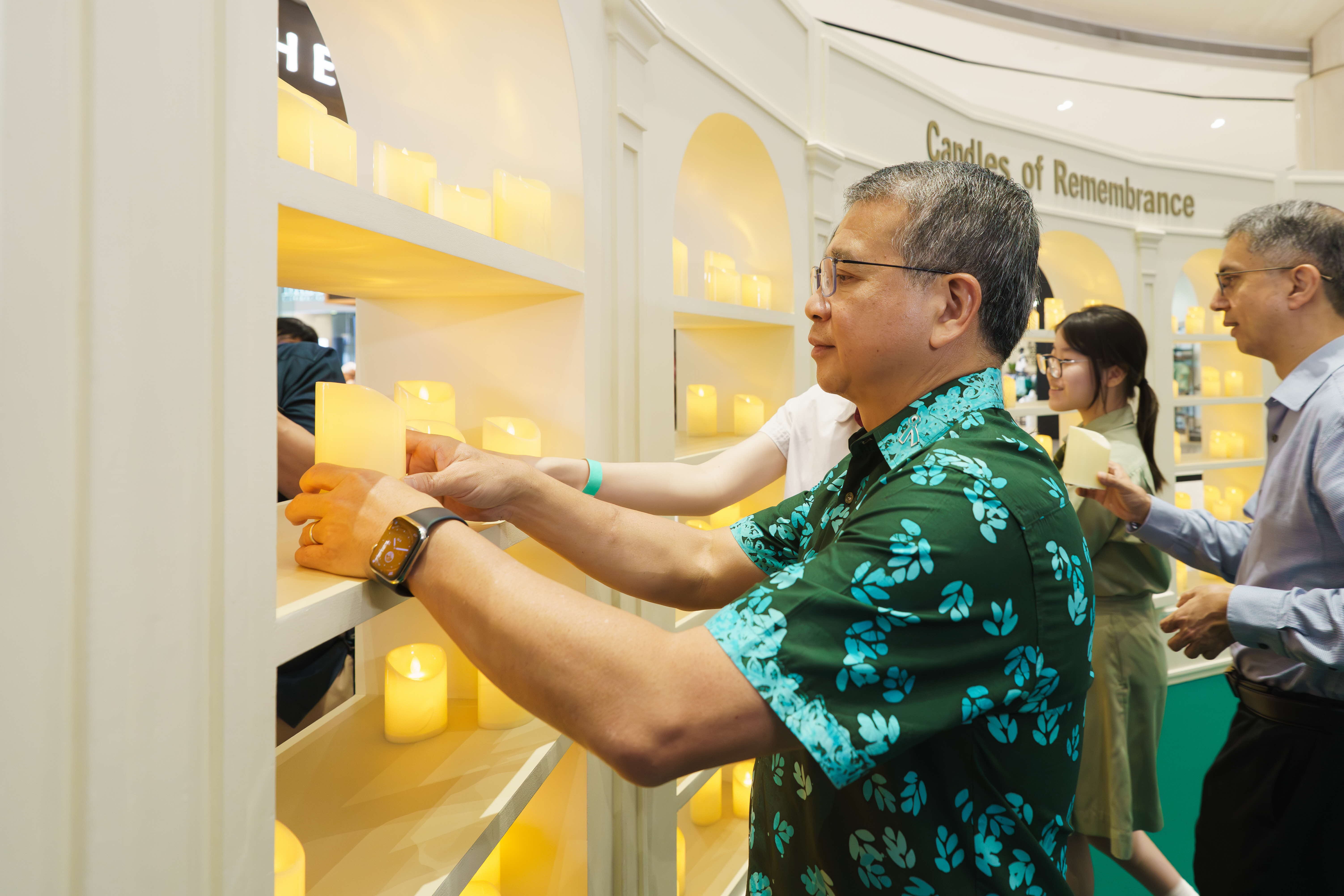 Photo 5 (CNB): Guest-of-Honour Mr Edwin Tong, Minister for Law and Second Minister for Home Affairs, and Associate Professor Muhammad Faishal Ibrahim, Acting Minister-in-Charge of Muslim Affairs and Senior Minister of State for the Ministry of Home Affairs, lighting a candle at the third Drug Victims Remembrance Day on 15 May 2026 in memory of the lives lost to drug abuse.