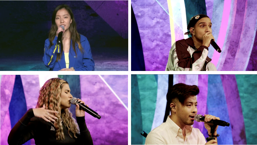 Four singers, each with a microphone, against a brightly colored abstract background.
