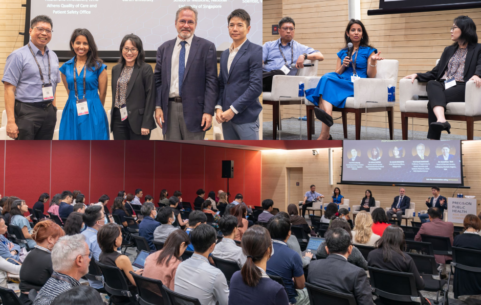 Audience observes a panel discussion where speakers sit on stage and one woman in a blue dress speaks into a microphone.