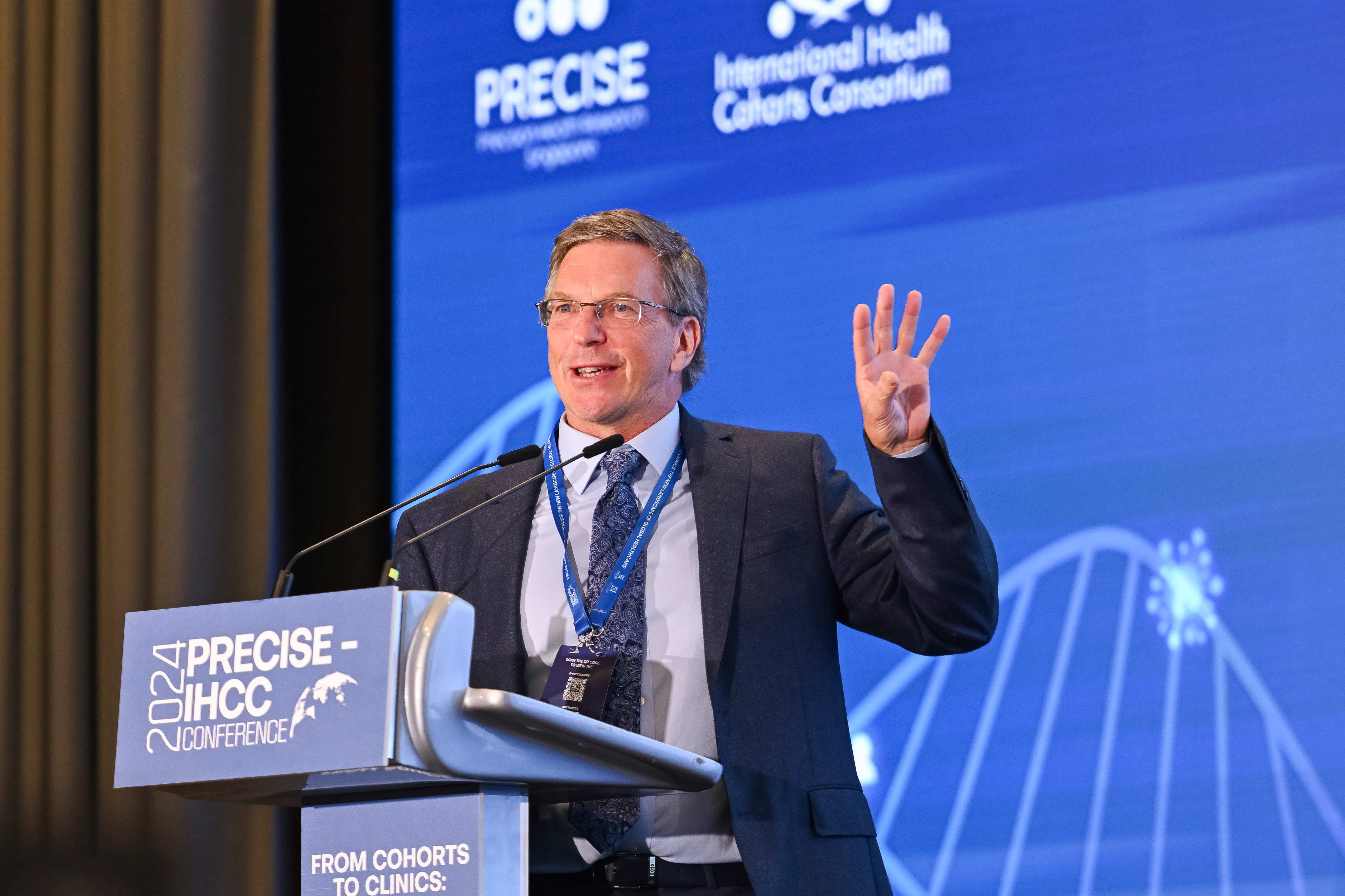 Julian speaking at the PRECISE IHCC Conference