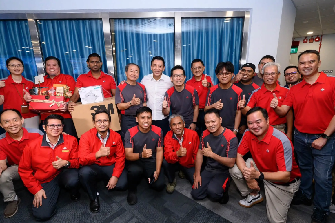Min Siow engaging public transport workers