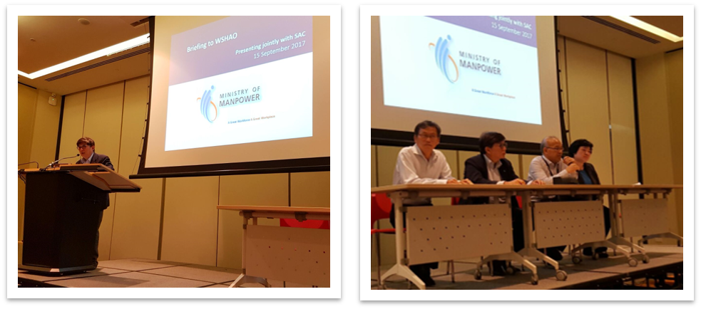 A speaker at a podium and a panel of four seated at a table, with a Ministry of Manpower slide projected behind them.