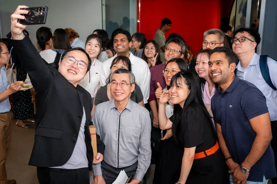 Image of a group of people taking a selfie