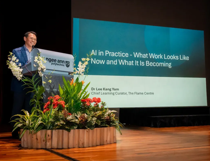 Dr Lee Kang Yam was giving his speech infront of a podium