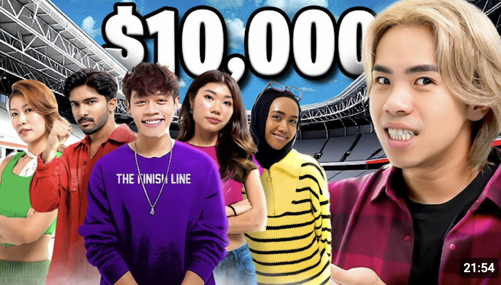 Video thumbnail titled $10,000 showing five people posing confidently in front of a stadium background.