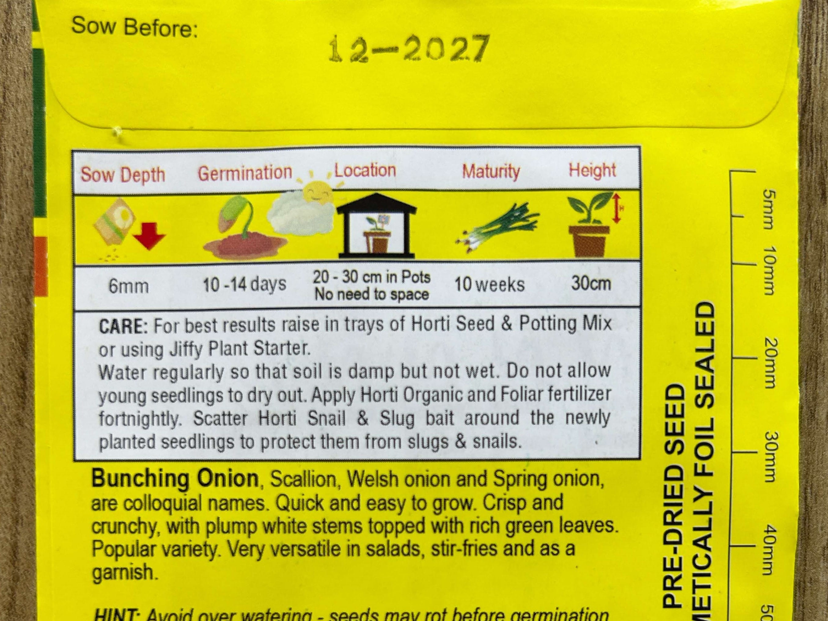 Image of the back of a seed packet with Instructions for sowing bunching onions, including depth, germination time, location, maturity, and height, with care tips.