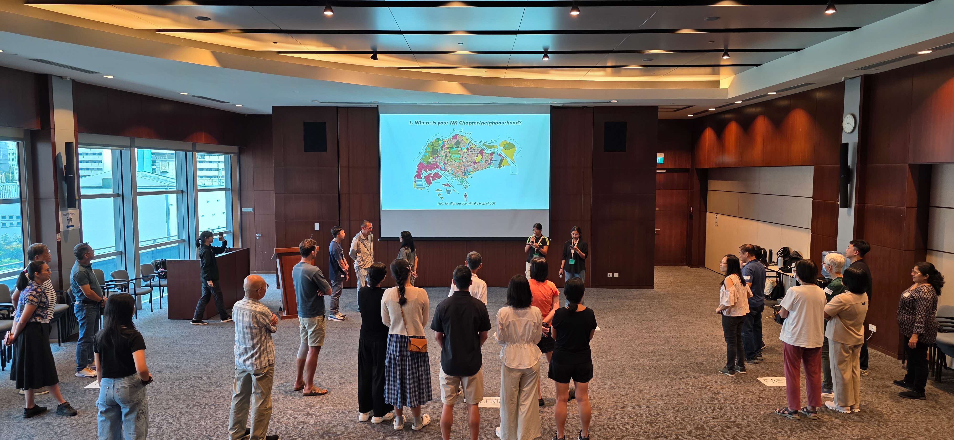 Nature Kakis viewing a map of Singapore to locate their Chapter's neighbourhoods