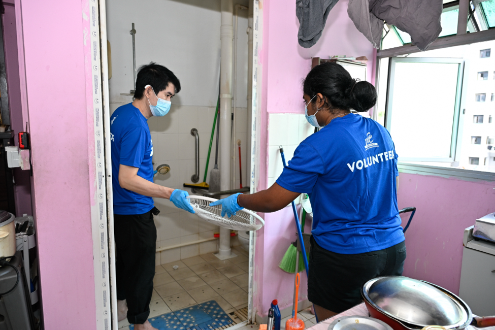 Our volunteers helping to clean a flat