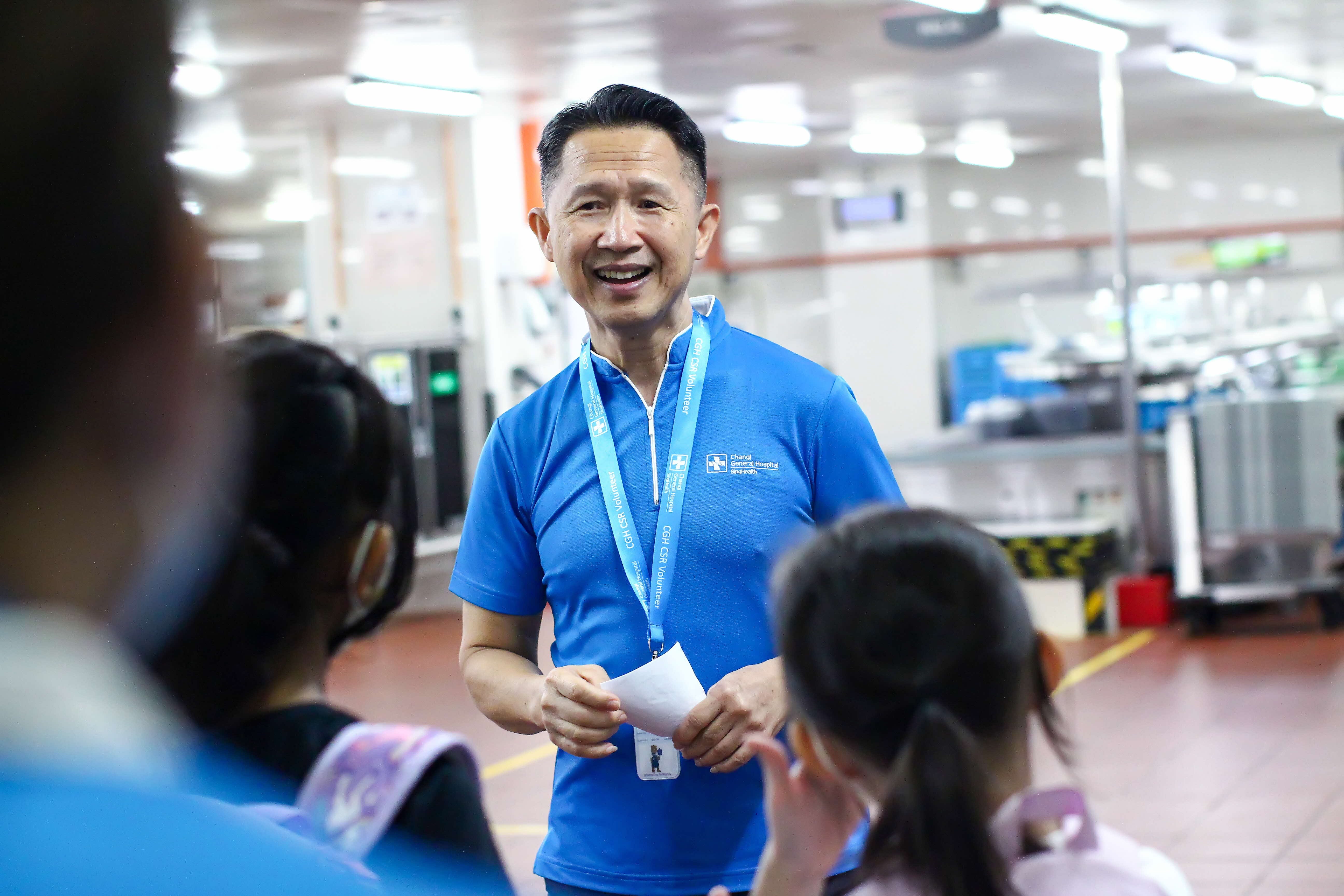 A CGH volunteer introduces participants to the hospital's facilities during a guided tour.