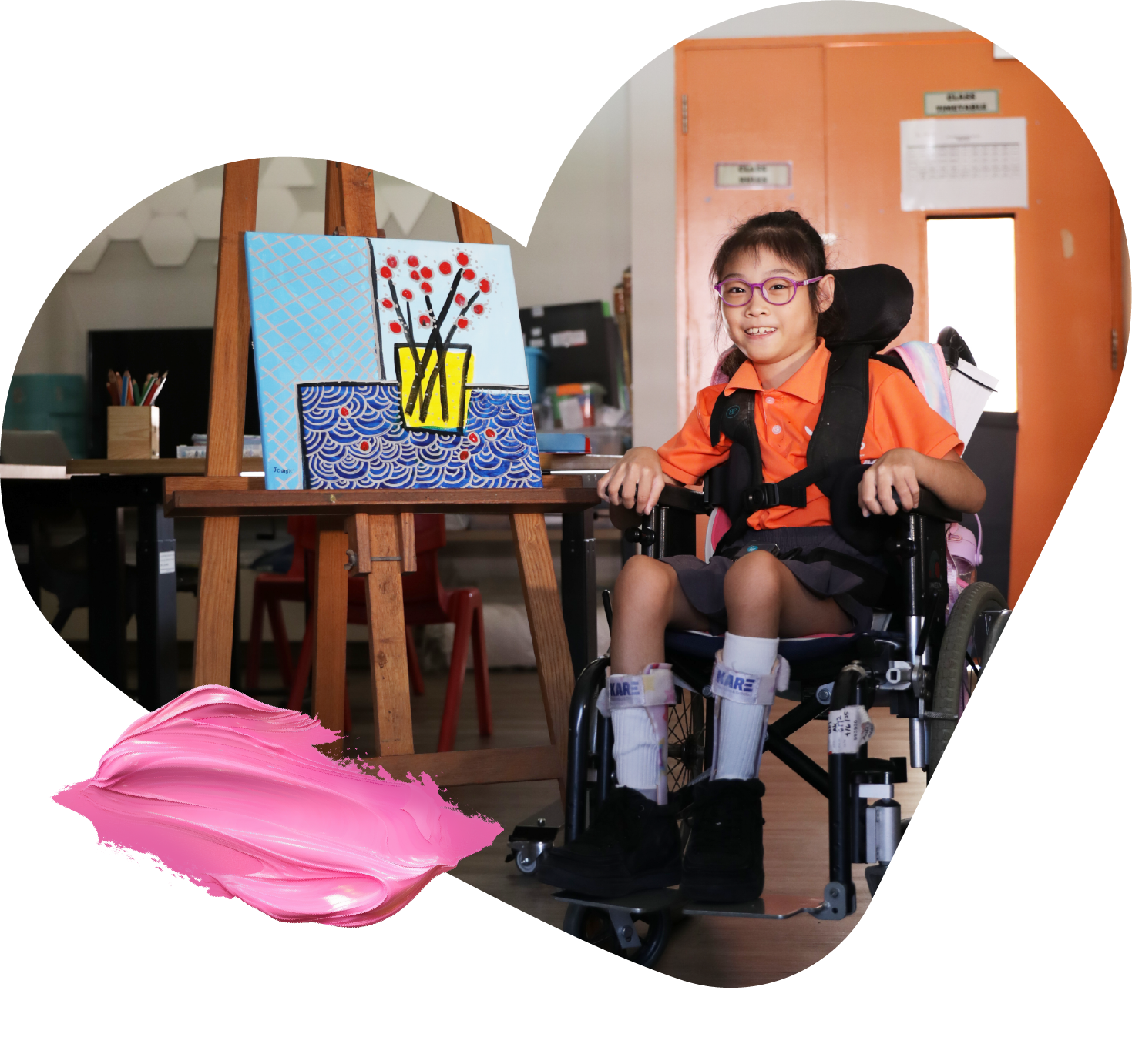 A woman with visual impairment showing her painting