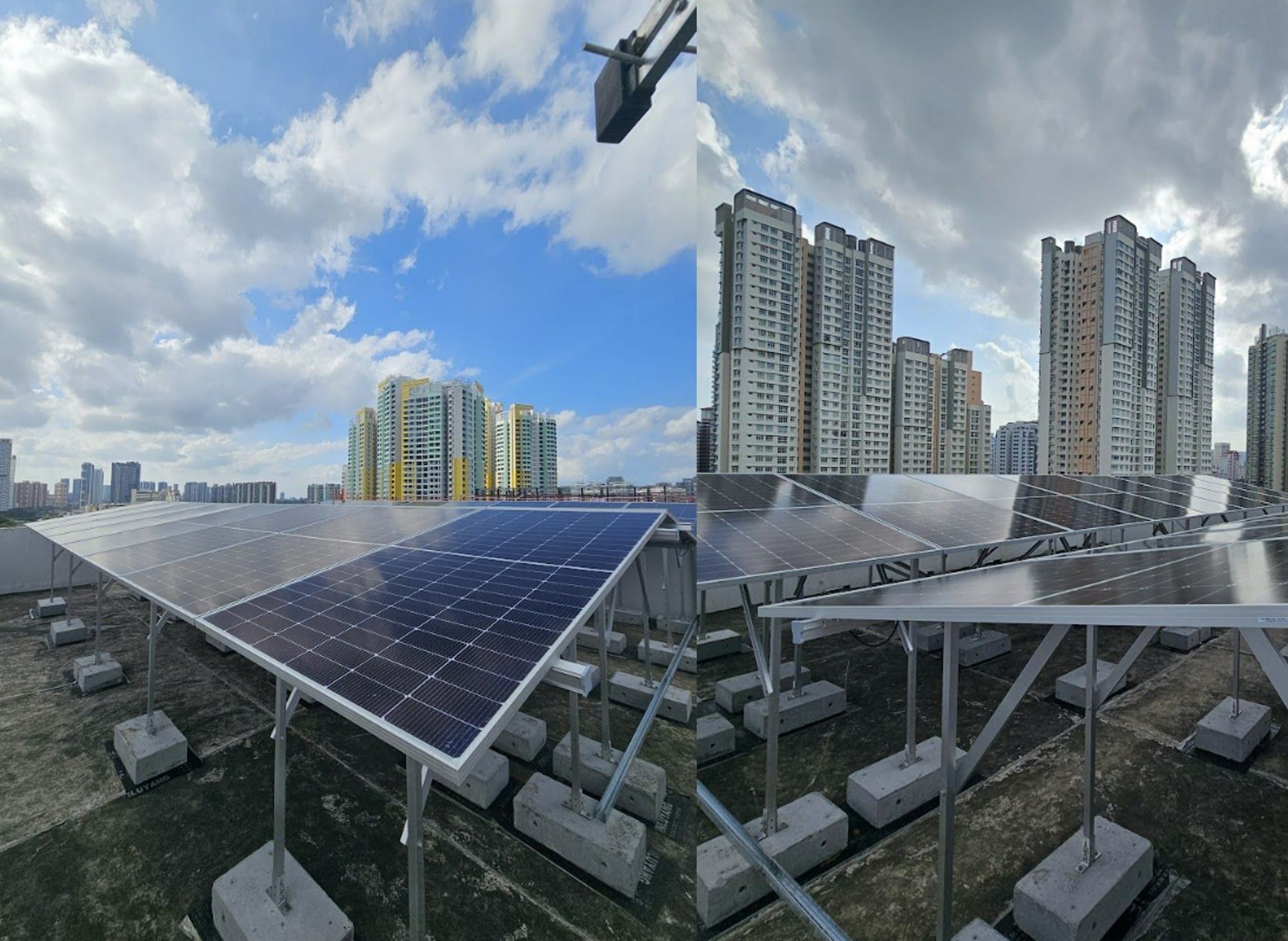Two solar panel arrays on rooftops, with tall residential buildings in the background under cloudy and sunny skies.