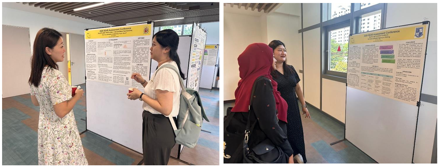 Conference participants looking at boards containing information