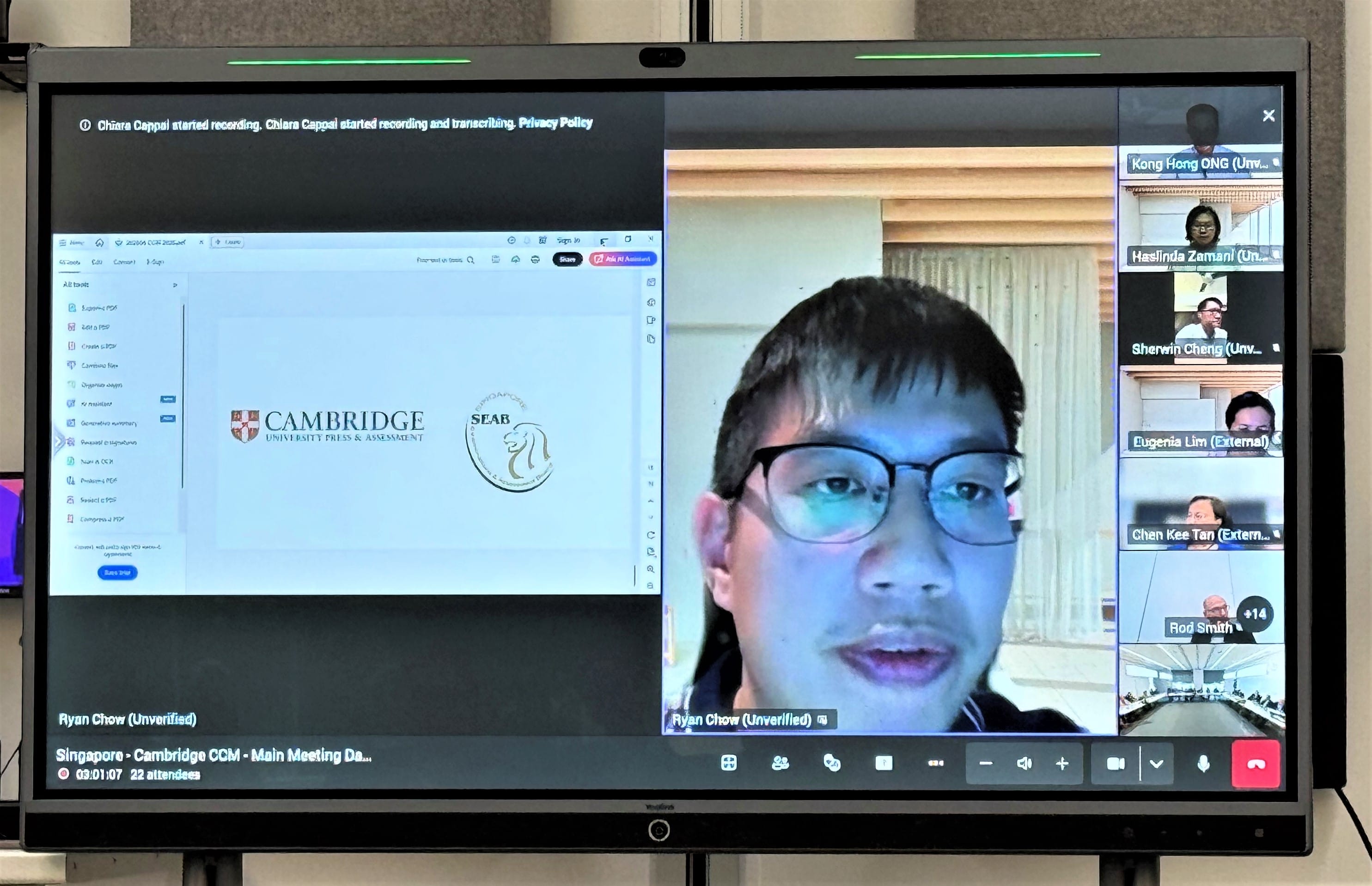 A Zoom meeting screen with logos of Cambridge University Press & Assessment and SEAB, showing a participants list on the right.