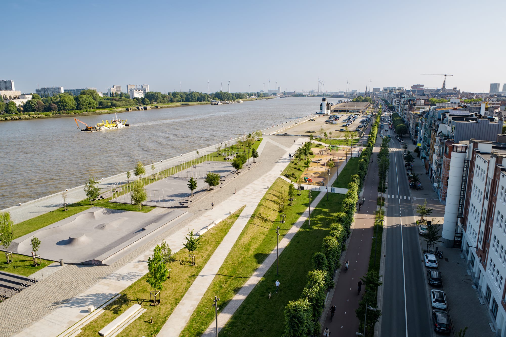Antwerp converts infrastructure barriers into community connectors through long-term planning and climate resilience initiatives. © SKYVISION