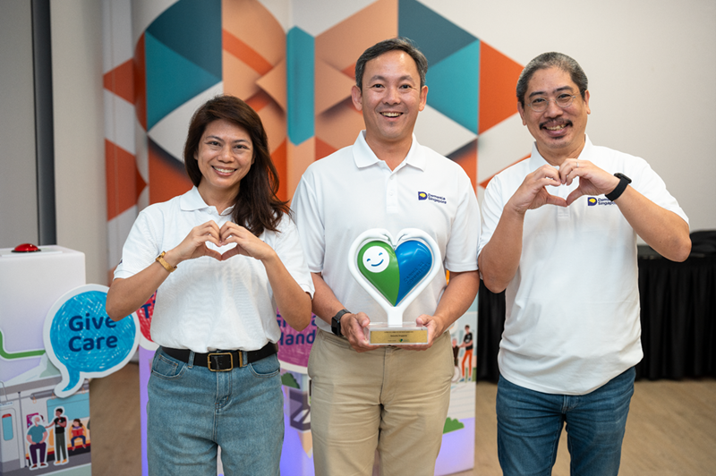 Group photo featuring CEO of Dementia Singapore Mr Bryan Tan (R) with his team at the Caring Commuter Week 2025
