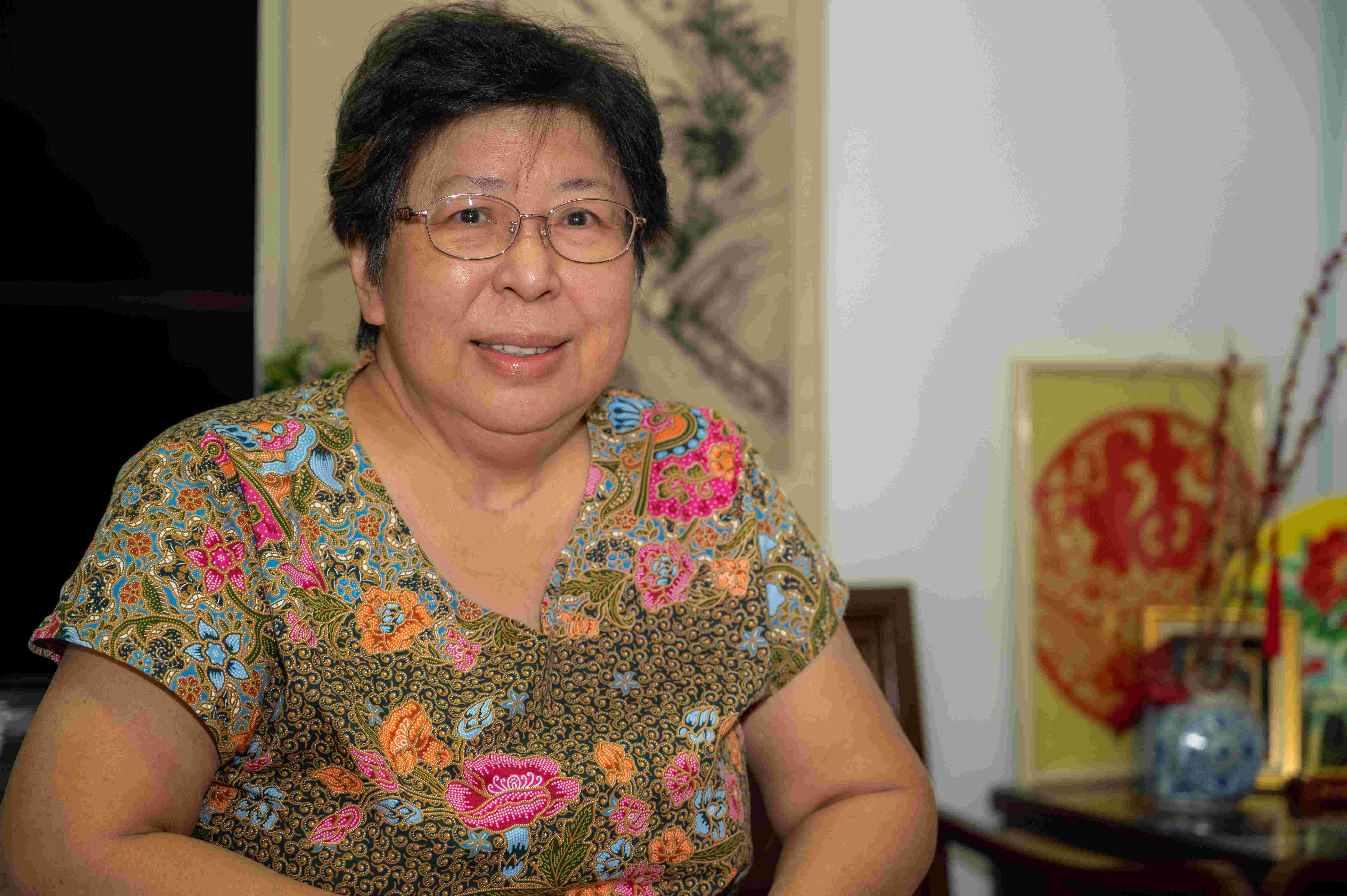 Portrait of Mdm Loo at home