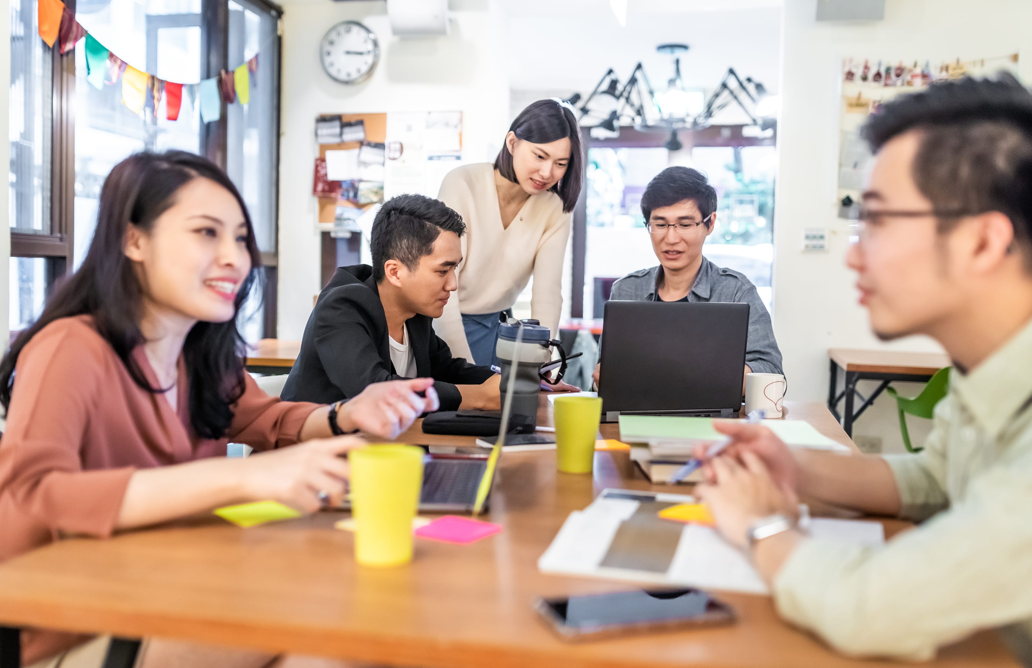 Team discussing on how to carry out emergency evacuation exercise.