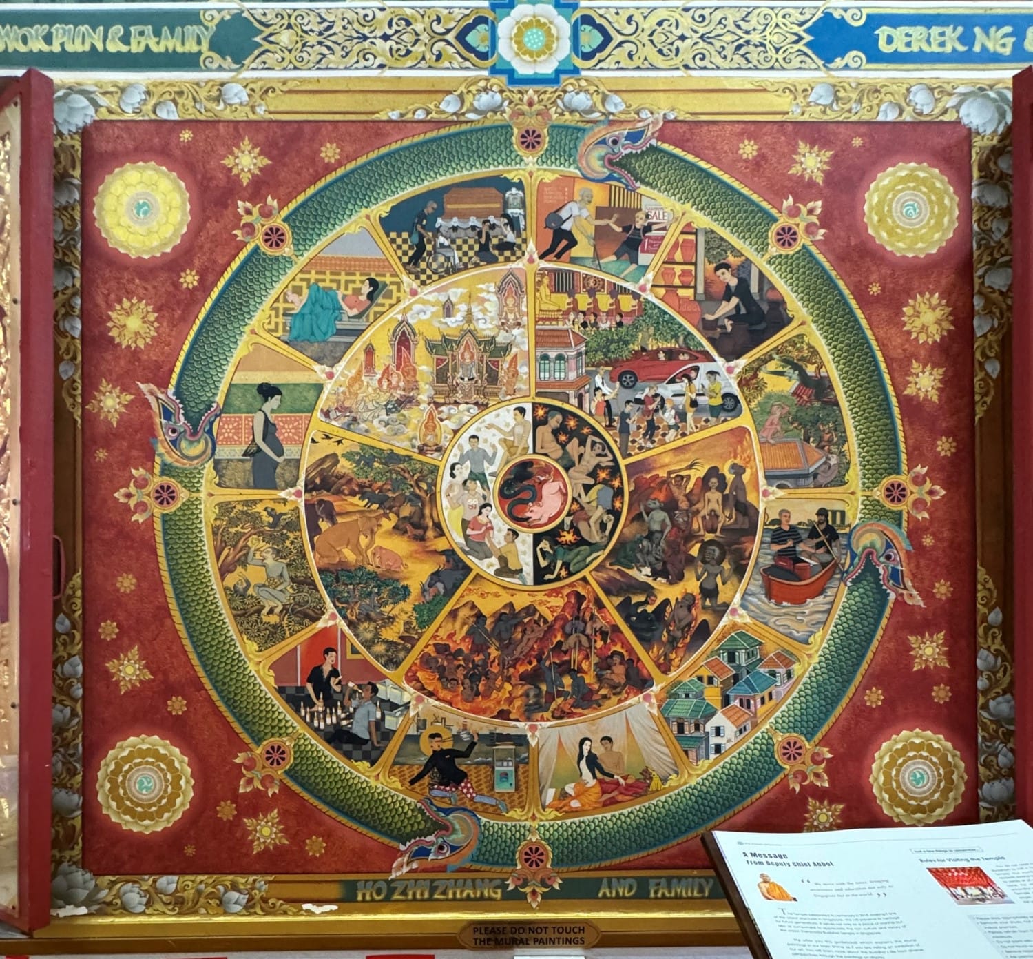 A mural of the wheel of life found inside the main hall of the temple. It shows (from innermost to outermost layer) the three poisons of attachment, ignorance and aversion; karma or cause and effect; the six realms of existence; and the twelve links of Dependent Origination. Photo by Jimmy Yap.