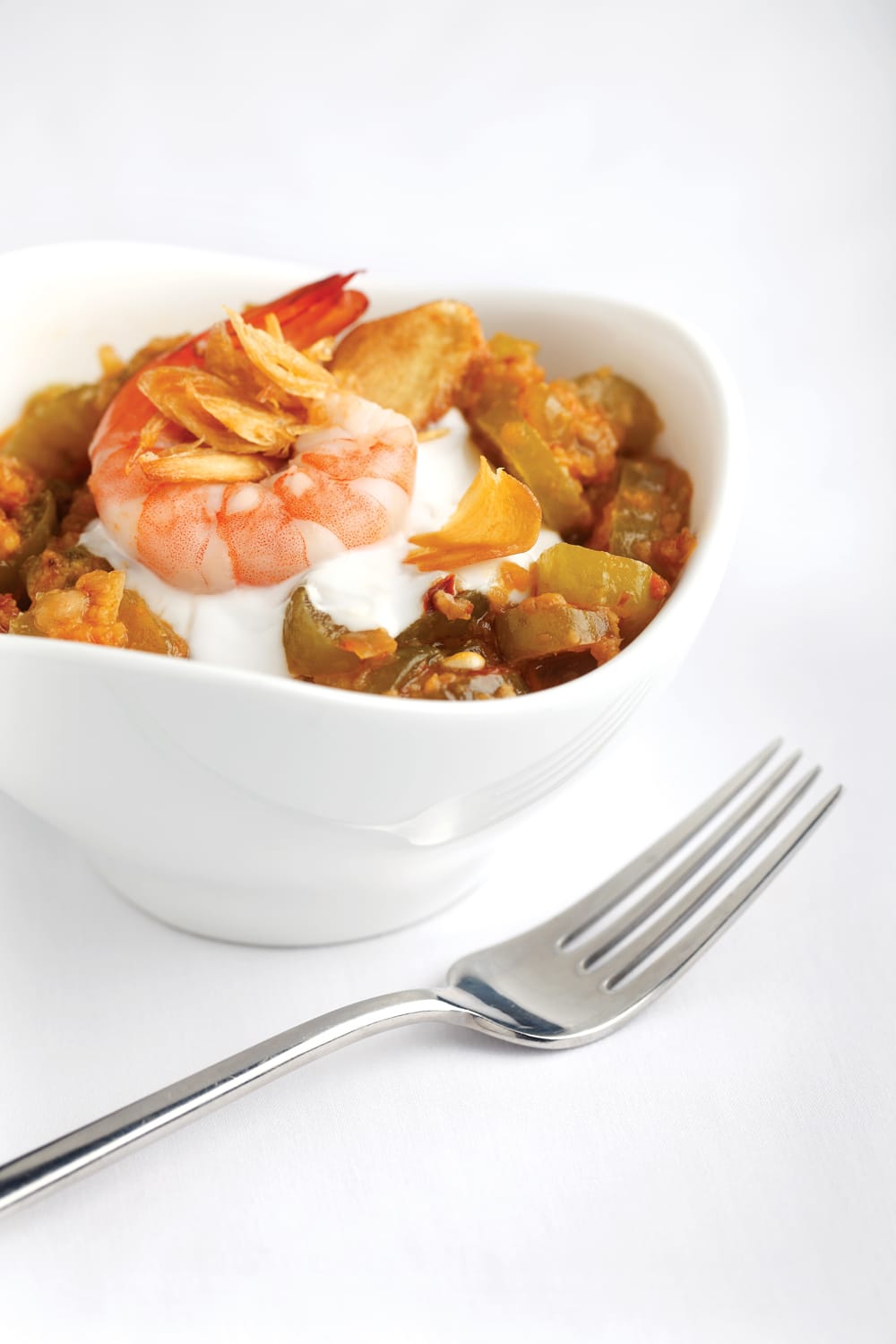 Belimbing (carambola) is another fruit that is seldom seen today. It is cooked in a sambal with prawns here. All rights reserved, Tan, S. (2011). Modern Nonya. Singapore: Marshall Cavendish Cuisine.