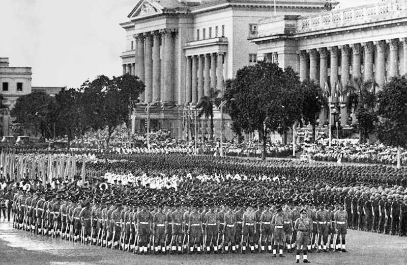 National Day Parade, 1968. No one flinched in a spontaneous display of grit and resilience in the midst of a raging thunderstorm. Yusof Ishak Collection, courtesy of National Archives of Singapore.