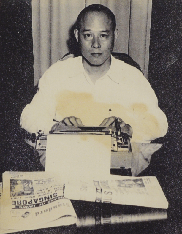 R.B. Ooi working on his typewriter, date unknown. Courtesy of Irene Lim.