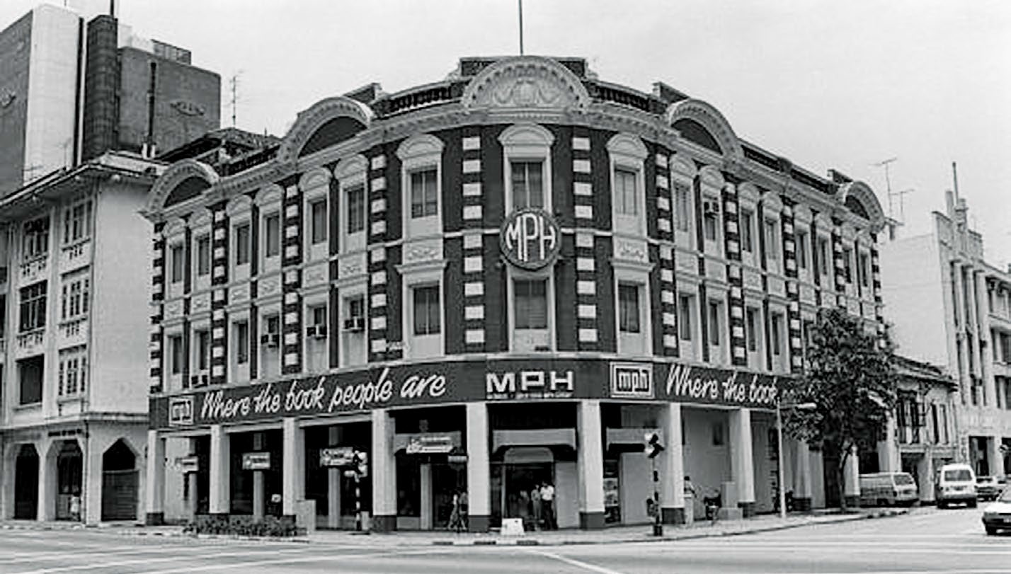 The Edwardian-style Methodist Publishing House building at the junction of Stamford Road and Armenian Street opened in 1904. It was subsequently renamed Malaya Publishing House and then Malaysia Publishing House. MPH bookshop has since moved out of this location, but for nearly a century this was the grand dame of the bookshop scene in Singapore. (The Singapore Management University currently leases the building.) This 1984 image is from the Lee Kip Lin Collection. All rights reserved. Lee Kip Lin and National Library Board, Singapore 2009.