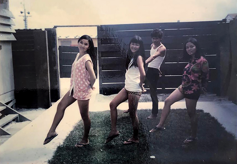 Veronica Young (centre) and the other entertainers rehearsing at the compound of the bungalow where they were housed in the Cho Lon area, with Harris Hamzah at the back, prior to the start of their tour, 1969. Courtesy of Veronica Young.