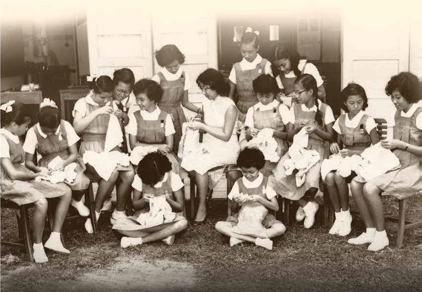 A sewing class in progress at one of the convent schools, c.1950s. Diana Koh Collection, courtesy of National Archives of Singapore.
