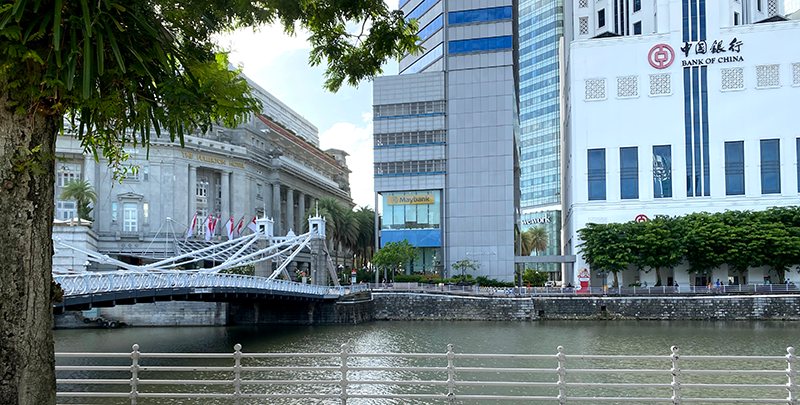 In this view from across the Singapore River, the Fullerton Hotel to the left of Cavenagh Bridge is where the Master Attendant’s Office would have been. To the immediate right of the bridge would have been Flint’s Building, where Emmerson’s Tiffin Rooms was located. It is now Maybank Tower. McAlister and Company’s godown would have been immediately opposite, just across Flint Street, where the Bank of China building stands today. Photo by Jimmy Yap.