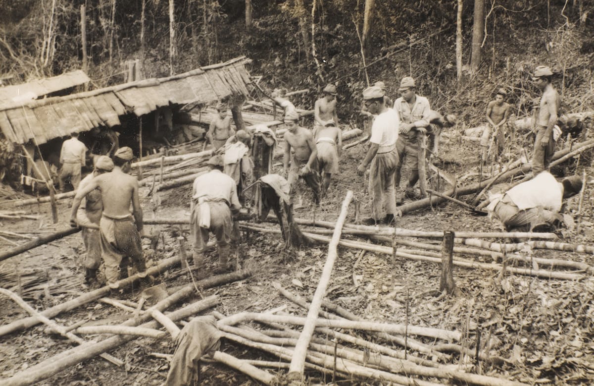 Japanese soldiers sorting felled trees, 1945. Image courtesy of the National Army Museum, London (NAM. 2009-11-4-6).