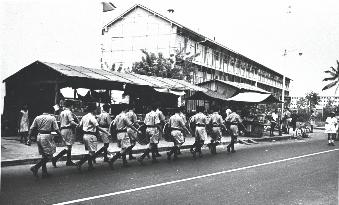 Police patrolling the streets before the demolition of hawker stalls at Margaret Drive in 1962. Courtesy of National Archives of Singapore.