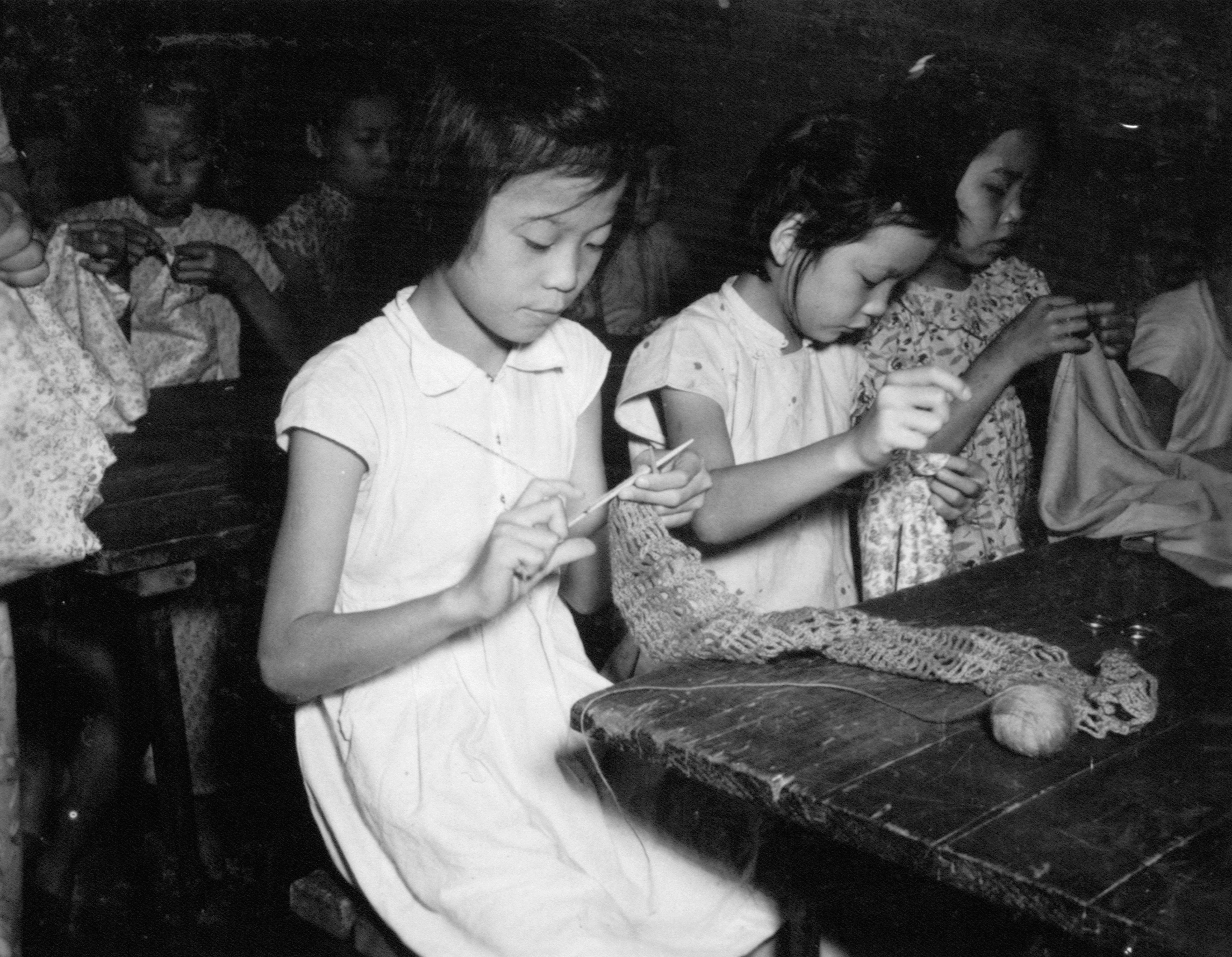 Girls learning how to knit at a Children’s Social Centre, 1951. Ministry of Information and the Arts Collection, courtesy of National Archives of Singapore.